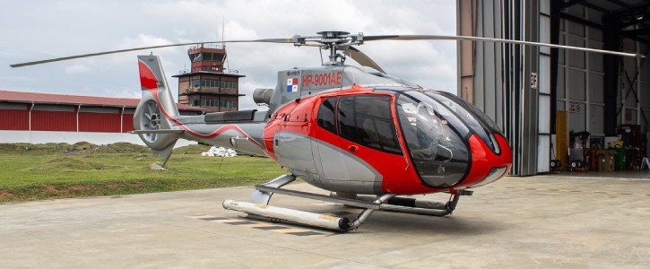 A Panamanian helicopter parked at Albrook airport that is used for tours.